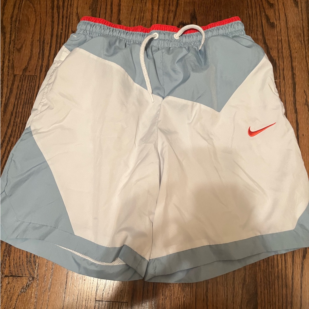 Nike athletic shorts and swim trunks size small men.